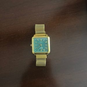 ON HOLD gold and blue watch